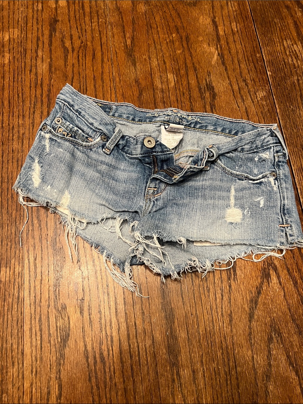 Vintage 2000’s Abercrombie kids low rise distressed denim cut-off shorts